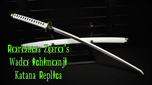 thumbnail interactive-video image 1 of One Piece Zoro Wado Ichimonji Katana Letter Opener – Miniature Samurai Sword With Sheath, Stand & Keyring 1 of 12